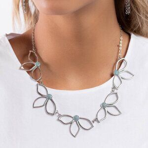 Silver floral petal necklace with blue center stones
